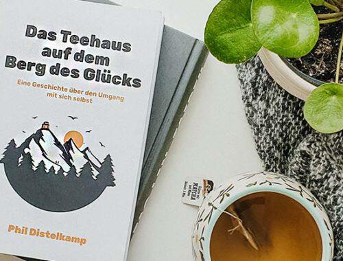 Das Teehaus auf dem Berg des Gluecks Phil Distelkamp Buch Rezension Beitragsbild