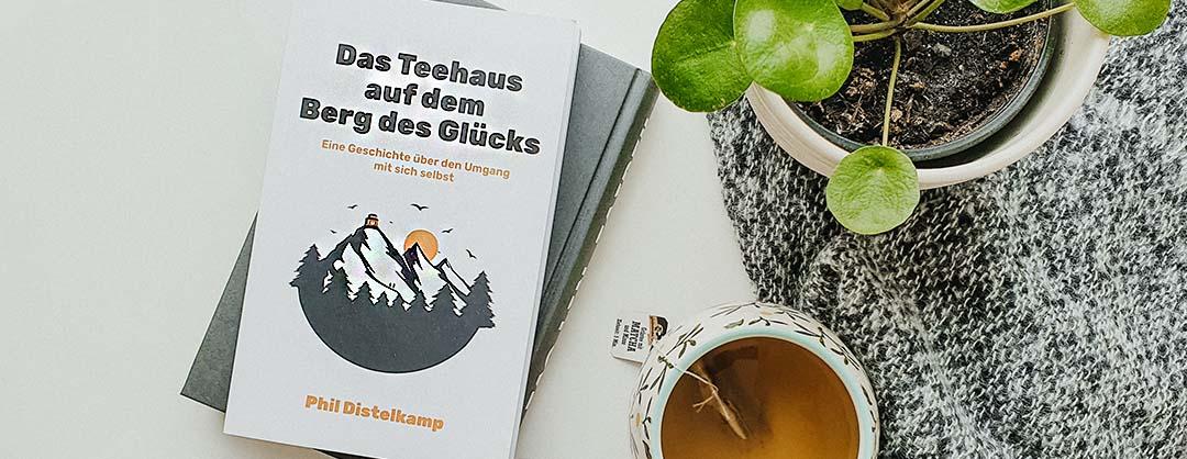 Das Teehaus auf dem Berg des Gluecks Phil Distelkamp Buch Rezension Beitragsbild